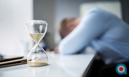 Busy manager reacting to workplace demands without time for reflection