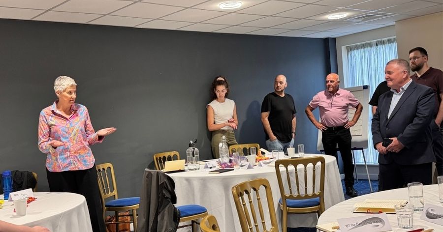 Trainer giving constructive feedback during a training session.