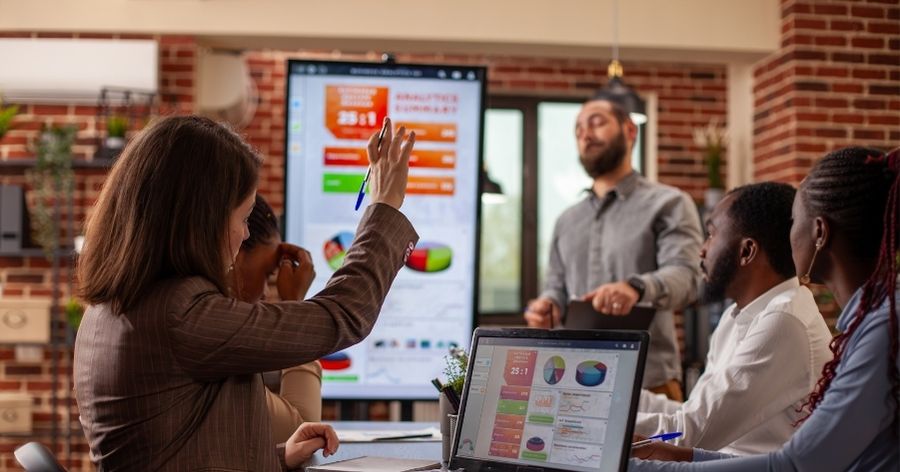 Trainer encouraging learner engagement through questioning.