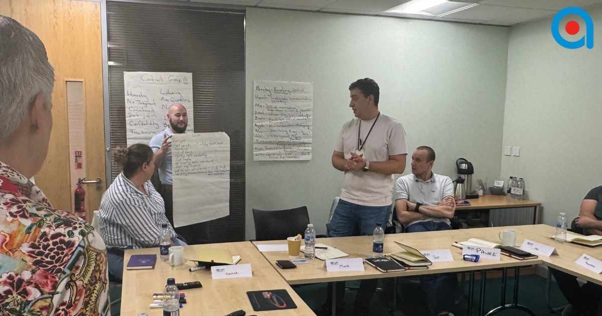 Master trainer delivering workplace transfer training.  