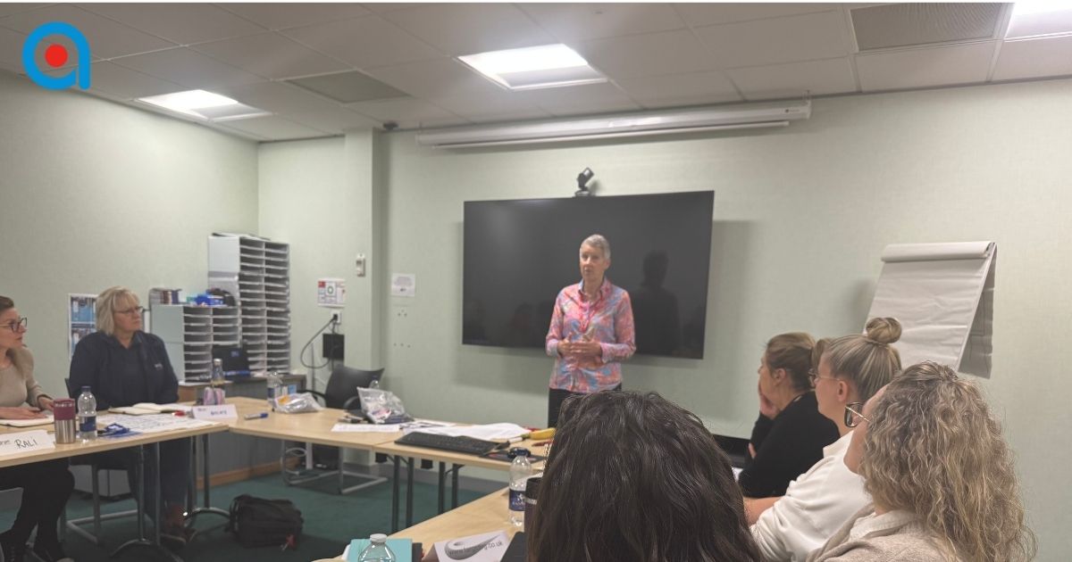 Trainer introducing an engaging workplace training session.