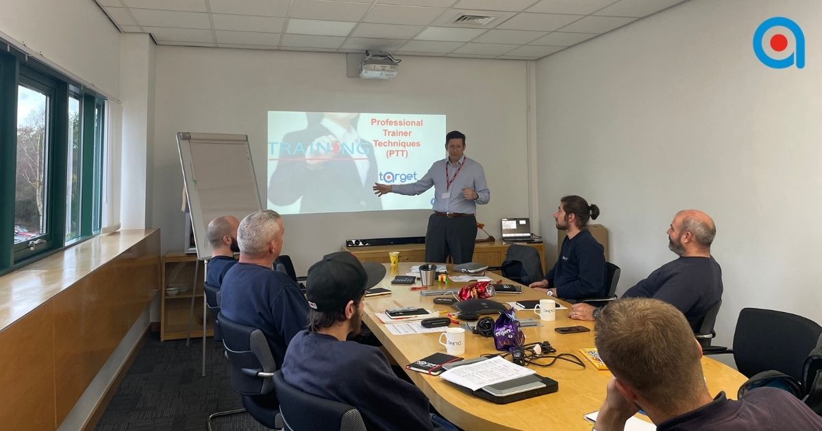 Trainer engaging learners without relying on PowerPoint slides.